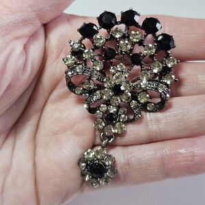 Silver Tone Black And Clear Rhinestone Brooch With A Dangling Charm